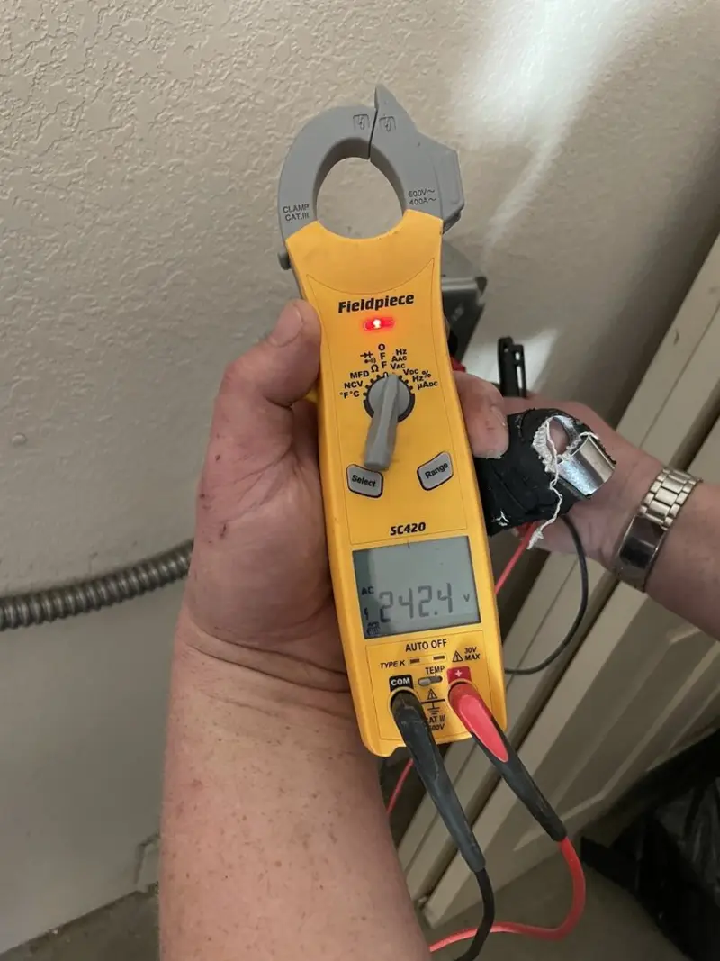 Voltage testing with clamp meter during Circuit Breaker Repair in Munroe Falls